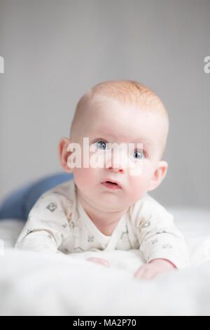 cute baby boy with a surprised expression Stock Photo