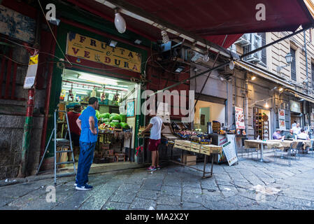 Palermo, Italy - August 10, 2017: Food street market called Ballaro with sellers closing their store in the old town of Palermo in Sicily, Italy Stock Photo