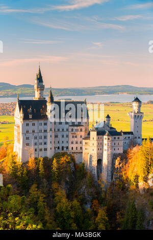 Neuschwanstein Castle in Autumn at sunset Europe, Germany, Bavaria, southwest Bavaria, Fussen, Schwangau Stock Photo