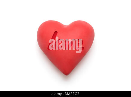 Red heart with imprinted love word over white background with clipping path Stock Photo