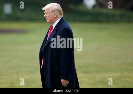 Washington, USA. 29th Mar, 2018. U.S. President Donald Trump walks on the South Lawn heading for the Marine One departing from the White House in Washington, DC, the United States, on March 29, 2018. Credit: Ting Shen/Xinhua/Alamy Live News