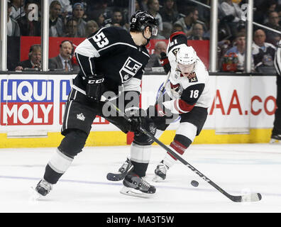 Los Angeles, California, USA. 29th Mar, 2018. Arizona Coyotes' forward Christian Dvorak (18) vies with Los Angeles Kings' defenseman Kevin Gravel (53) during a 2017-2018 NHL hockey game in Los Angeles on March 29, 2018. The Kings won 4-2. Credit: Ringo Chiu/ZUMA Wire/Alamy Live News Stock Photo