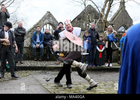 Heptonstall, UK. 30th March, 2018. The Heptonstall Players entertain with the annual traditional Pace Egg Play taking place throughout Good Friday in the historical village of Heptonstall, 30th March, 2018 (C)Barbara Cook/Alamy Live News Stock Photo