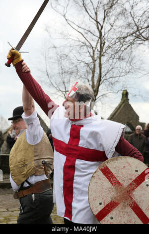 Heptonstall, UK. 30th March, 2018. The Heptonstall Players entertain with the annual traditional Pace Egg Play taking place throughout Good Friday in the historical village of Heptonstall, 30th March, 2018 (C)Barbara Cook/Alamy Live News Stock Photo