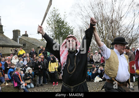 Heptonstall, UK. 30th March, 2018. The Heptonstall Players entertain with the annual traditional Pace Egg Play taking place throughout Good Friday in the historical village of Heptonstall, 30th March, 2018 (C)Barbara Cook/Alamy Live News Stock Photo