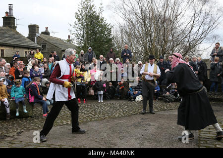 Heptonstall, UK. 30th March, 2018. The Heptonstall Players entertain with the annual traditional Pace Egg Play taking place throughout Good Friday in the historical village of Heptonstall, 30th March, 2018 (C)Barbara Cook/Alamy Live News Stock Photo