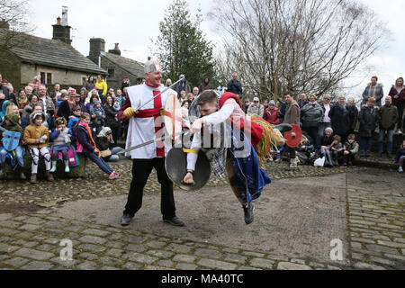 Heptonstall, UK. 30th March, 2018. The Heptonstall Players entertain with the annual traditional Pace Egg Play taking place throughout Good Friday in the historical village of Heptonstall, 30th March, 2018 (C)Barbara Cook/Alamy Live News Stock Photo