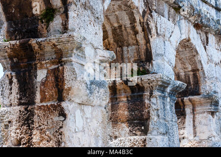 Ancient rows of arc columns in Pula Coliseum monument Stock Photo