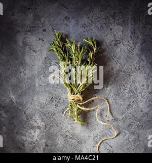 Branch Bunch Fresh Rosemary Food Concept Grass Crop Spices Harvest Herbs for Medicine and Cooking on Gray Background Dark Key Low Key Stock Photo