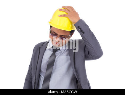 engineer in suit with headache and problems isolated on a white background Stock Photo