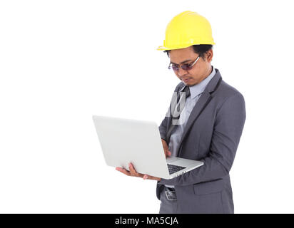 engineer using laptop isolated on a white background Stock Photo
