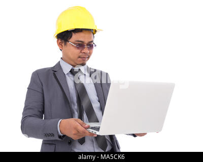 engineer using laptop isolated on a white background Stock Photo