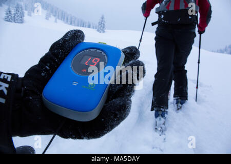 ski tourers while climbing the Lenggrieser Hütte (hut) in winter, Lenggries, Bavarian Prealps, Bavaria, Germany Stock Photo