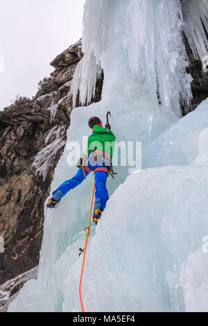 Ice climbing, Specchi icefall (Cascata degli Specchi), Malenco Valley, Valtellina, Lombardy, province of Sondrio, Italy Stock Photo