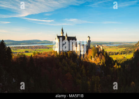 Neuschwanstein Castle in Autumn at sunset Europe, Germany, Bavaria, southwest Bavaria, Fussen, Schwangau Stock Photo