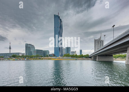 Vienna, Austria, Europe. The skyscrapers of Donau City and the Reichsbrücke Stock Photo