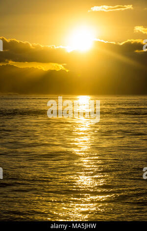 Dramatic sunset over Moorea ,Papeete, Tahiti, French Polynesia Stock Photo