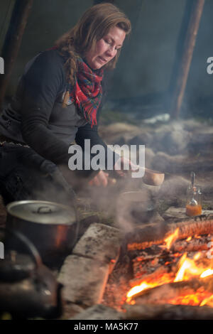 Traditional Sami Meal Preapered in a Lavvu. Stock Photo