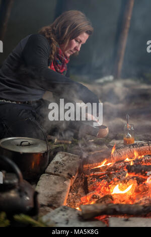 Traditional Sami Meal Preapered in a Lavvu. Stock Photo