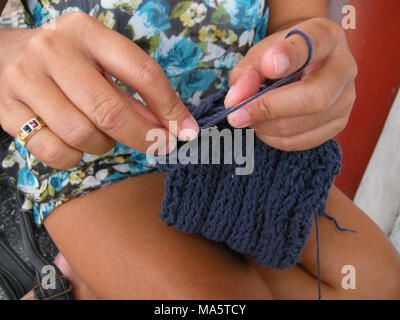 The creative art of crocheting produces colourful garments and useful household objects, Pattaya, Thailand Stock Photo