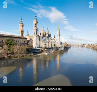 Zaragoza - The Basilica del Pilar and the riverside in morning light. Stock Photo