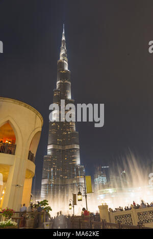 DUBAI, UAE - MARCH 24, 2017: The nightly Burj Khalifa and the fountain.