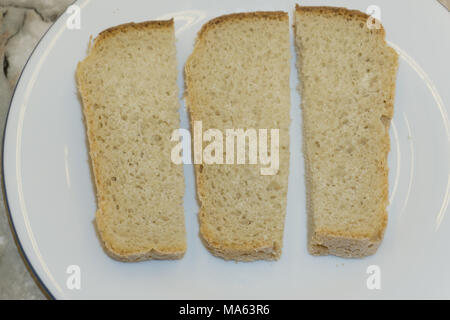 Set of three slices toast bread isolated on white Stock Photo