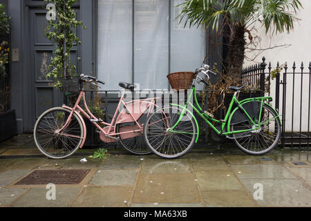 Vintage bicycles parked outside a property on Warren Street, Camden, London, NW1, UK Stock Photo