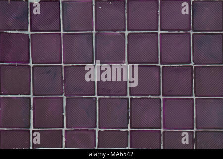 red glass block wall and red brick floor background Stock Photo