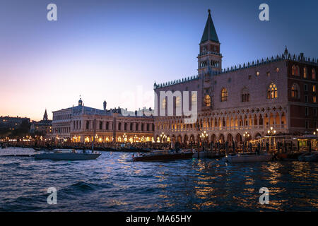 Venice (Italy) - Ducal Palace and San Marco Square seen from Venice Lagoon at night Stock Photo