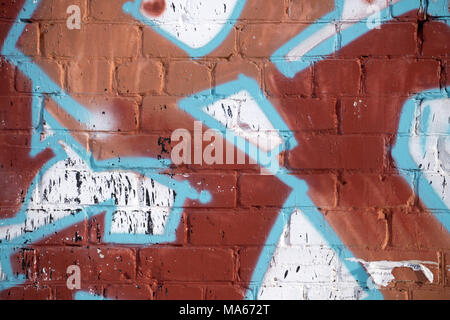 White paint stroke copyspace on a cement block wall. Urban Grunge Stock Photo