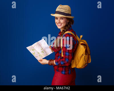 smiling fit traveller woman in hiking clothes with bag on summer Tuscany  trekking looking into the distance Stock Photo - Alamy