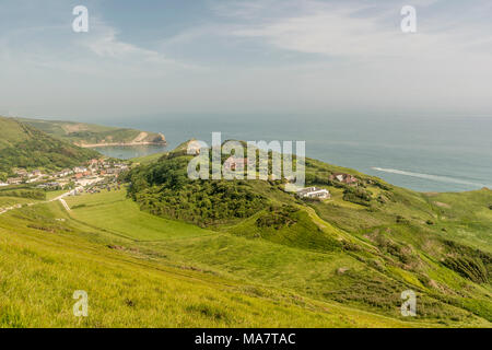 Looking down to Lulworth Cove from high up on the South West Coast Path, Dorset, UK. Stock Photo