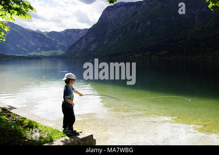 Fishing Poles Mounted on the Holder and Set Up at the Shore of a Lake Stock  Image - Image of outdoor, landscape: 153905367