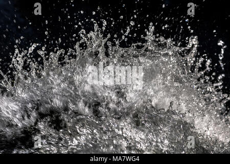 Water splash detail transparent on black background, sparkling water drops, Plitvice lakes, Croatia Stock Photo