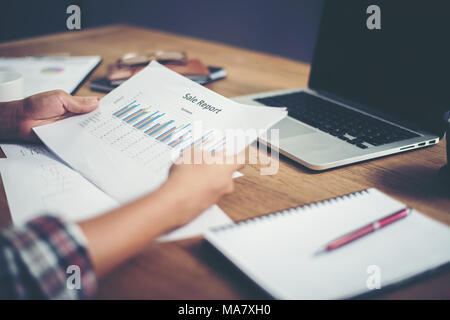 young  Businessman woman hands reviewing analyzing financial data chart. Stock Photo