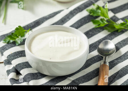 Creamy Homemade Ranch Dressing in a Bowl Stock Photo