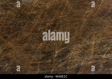 Seamless brown granite texture as background.  Stock Photo