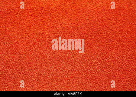 Saturated orange textile background. Stock Photo