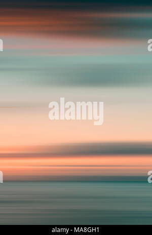 Abstract of sea and sky blurred using intentional camera movement Stock Photo