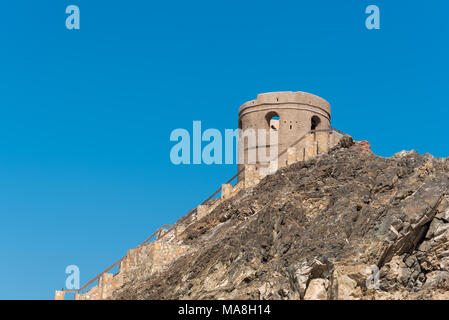 Old coastal watchtower with cast iron canon at Riyam close to Mutrah, Old Muscat in Oman Stock Photo