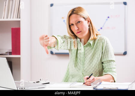 Businesswoman is refusing to work overtime. Stock Photo