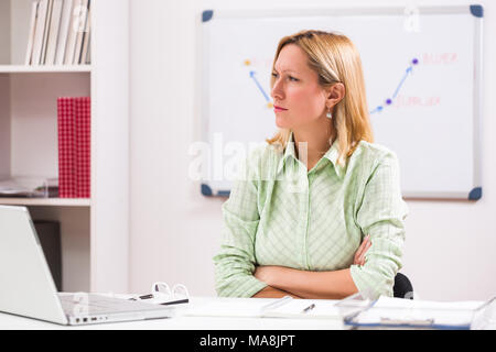 Businesswoman is refusing to work overtime. Stock Photo