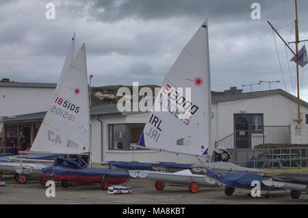 laser racing yachts being made ready to launch at baltimore yacht club, ireland, a favourite tourist and holiday destination on the south coast. Stock Photo