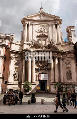 A jeep with armed security outside the church of San Marcello al Corso on Via del Corso, Rome