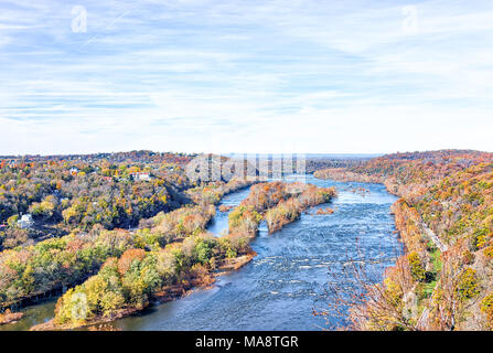 Harper's Ferry overlook with colorful orange yellow foliage fall autumn forest with small village town by Potomac river blue in West Virginia, WV Stock Photo
