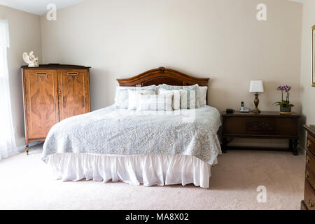 Closeup Of New Bed Comforter With Decorative Pillows Headboard In