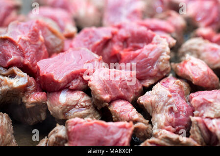 Pieces of beef cooking in frying pan Stock Photo