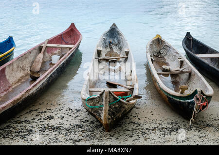 canoe boats on beach - traditional wooden boats, - Guna Yala, Panama Stock Photo