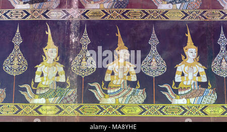 Wall murals depicting scenes from the Ramakien epic, Wat Mahathat, Phetchaburi, Thailand Stock Photo